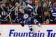 WINNIPEG, MB - MARCH 14: Bryan Little #18 of the Winnipeg Jets jumps over the boards during first period action against the New York Rangers at the MTS Centre on March 14, 2014 in Winnipeg, Manitoba, Canada. The Rangers defeated the Jets 4-2. (Photo by Jonathan Kozub/NHLI via Getty Images)