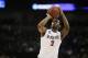 San Diego State’s Xavier Thames (2) takes a free throw during the second-round game of the NCAA men's college basketball tournament against New Mexico State, in Spokane, Wash., Thursday, March 20, 2014. (AP Photo/Young Kwak)
