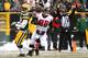 GREEN BAY, WI - DECEMBER 08: Tony Gonzalez #88 of the Atlanta Falcons celebrates after making a touchdown during the first half of play against the Green Bay Packers at Lambeau Field on December 08, 2013 in Green Bay, Wisconsin. (Photo by Mike McGinnis/Getty Images)