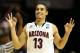 SAN DIEGO, CA - MARCH 23: Nick Johnson #13 of the Arizona Wildcats celebrates in the second half of their 84 to 61 win over the Gonzaga Bulldogs during the third round of the 2014 NCAA Men's Basketball Tournament at Viejas Arena on March 23, 2014 in San Diego, California. (Photo by Jeff Gross/Getty Images)