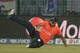 CHITTAGONG, BANGLADESH - MARCH 27: Jade Dernbach of England fails to get a catch during the ICC World Twenty20 Bangladesh 2014 Group 1 match between England and Sri Lanka at Zahur Ahmed Chowdhury Stadium on March 27, 2014 in Chittagong, Bangladesh. (Photo by Gareth Copley/Getty Images)