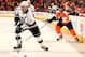 PHILADELPHIA, PA - MARCH 24: Mike Richards #10 of the Los Angeles Kings takes the puck as Jakub Voracek #93 of the Philadelphia Flyers defends at Wells Fargo Center on March 24, 2014 in Philadelphia, Pennsylvania. (Photo by Elsa/Getty Images)