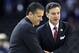FILE - in this March 31, 2012, file photo, Louisville head coach Rick Pitino, right, shakes hands with Kentucky head coach John Calipari before the first half of an NCAA Final Four semifinal college basketball tournament game in New Orleans. Kentucky has fallen out of the Top 25 and the defending national champs are still looking to establish themselves heading into the instate showdown with rival Louisville. The fourth-ranked Cardinals Saturday will try to end a four-game skid against the Wildcats. (AP Photo/David J. Phillip, File)
