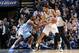 SAN ANTONIO, TX - March 26: Tim Duncan #21 of the San Antonio Spurs handles the ball against Kenneth Faried #35 of the Denver Nuggets at the AT&T Center on March 26, 2014 in San Antonio, Texas. NOTE TO USER: User expressly acknowledges and agrees that, by downloading and or using this photograph, user is consenting to the terms and conditions of the Getty Images License Agreement. Mandatory Copyright Notice: Copyright 2014 NBAE (Photos by D. Clarke Evans/NBAE via Getty Images)