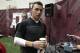 Texas A&M quarterback Johnny Manziel leaves the McFerrin Athletic Center after pro day for NFL football representatives in College Station, Texas, Thursday, March 27, 2014. (AP Photo/Patric Schneider)