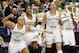 Mar 8, 2014; Greensboro, NC, USA; Notre Dame Fighting Irish players Kayla McBride (21), Ariel Braker (44), Natalie Achonwa (11) and Jewell Loyd (32) react during the closing minute against North Carolina State at the Greensboro Coliseum. Mandatory Credit: Ellen Ozier-USA TODAY Sports
