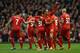 LIVERPOOL, ENGLAND - FEBRUARY 23: Jordan Henderson of Liverpool celebrates scoring the second goal with his team-mates during the Barclays Premier League match between Liverpool and Swansea City at Anfield on February 23, 2014 in Liverpool, England. (Photo by Clive Brunskill/Getty Images)