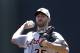 Detroit Tigers starting pitcher Justin Verlander throws during the first inning of a spring exhibition baseball game against the Atlanta Braves in Kissimmee, Fla., Friday, March 21, 2014. (AP Photo/Carlos Osorio)