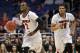 Mar 20, 2014; Orlando, FL, USA; Louisville Cardinals guard Russ Smith (2) brings the ball up the court against the Manhattan Jaspers during the second half of a men's college basketball game during the second round of the 2014 NCAA Tournament at Amway Center. Mandatory Credit: Kim Klement-USA TODAY Sports