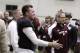 Texas A&M quarterback Johnny Manziel talks with NFL representatives at pro day in College Station, Texas, Thursday, March 27, 2014. (AP Photo/Patric Schneider)