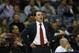 Dayton head coach Archie Miller watches play against Stanford during the first half in a regional semifinal game at the NCAA college basketball tournament, Thursday, March 27, 2014, in Memphis, Tenn. (AP Photo/John Bazemore)