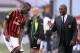 MILAN, ITALY - MARCH 16: Head coach AC Milan Clarence Seedorf (R) and Mario Balotelli talk during the Serie A match between AC Milan and Parma FC at San Siro Stadium on March 16, 2014 in Milan, Italy. (Photo by Claudio Villa/Getty Images)