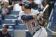 Detroit Tigers Nick Castellanos (9) hits a first-inning, RBI double off New York Yankees starting pitcher Hiroki Kuroda in a spring exhibition baseball game in Tampa, Fla., Wednesday, March 12, 2014. Alex Avila scored on the play. (AP Photo/Kathy Willens)