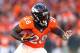 DENVER, CO - JANUARY 19: Montee Ball #28 of the Denver Broncos runs with the ball against the New England Patriots during the AFC Championship game at Sports Authority Field at Mile High on January 19, 2014 in Denver, Colorado. (Photo by Elsa/Getty Images)