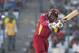 West Indies' batsman Chris Gayle plays a shot during their ICC Twenty20 Cricket World Cup match against Australia in Dhaka, Bangladesh, Friday, March 28, 2014. (AP Photo/Aijaz Rahi)
