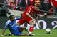 Chelsea's Ashley Cole, left reacts as Liverpool's Steven Gerrard takes the ball away after a tackle during the English FA Cup Final soccer match at Wembley Stadium in London, Saturday, May 5, 2012. (AP Photo/Tim Hales)