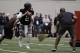 Texas A&M quarterback Johnny Manziel passes the ball during a drill at pro day for NFL football representatives in College Station, Texas, Thursday, March 27, 2014. (AP Photo/Patric Schneider)