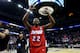 MEMPHIS, TN - MARCH 27: Kendall Pollard #22 of the Dayton Flyers celebrates after defeating the Stanford Cardinal 82-72 in a regional semifinal of the 2014 NCAA Men's Basketball Tournament at the FedExForum on March 27, 2014 in Memphis, Tennessee. (Photo by Streeter Lecka/Getty Images)