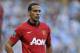 Manchester United's Rio Ferdinand during their English Premier League soccer match against Manchester City at the Etihad Stadium in Manchester, England, Sunday Sept 22, 2013. (AP Photo/Clint Hughes)