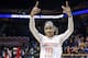 Tennessee guard Meighan Simmons acknowledges the crowd as she leaves the court following a win over St. John's in an NCAA women's college basketball second-round tournament game Monday, March 24, 2014, in Knoxville, Tenn. Simmons scored 17 points as Tennessee won 67-51. (AP Photo/Mark Humphrey)