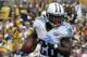 Tennessee Titans running back Chris Johnson (28) runs during the third quarter of an NFL football game against the Pittsburgh Steelers in Pittsburgh, Sunday, Sept. 8, 2013. The Titans won 16-9. (AP Photo/Gene J. Puskar)