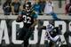 JACKSONVILLE, FL - DECEMBER 05: Maurice Jones-Drew #32 of the Jacksonville Jaguars runs past D.J. Swearinger #36 of the Houston Texans during the game at EverBank Field on December 5, 2013 in Jacksonville, Florida. (Photo by Sam Greenwood/Getty Images)