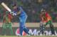 DHAKA, BANGLADESH - MARCH 28: Rohit Sharma of India bats as Mushfiqur Rahim of Bangladesh looks on during the ICC World Twenty20 Bangladesh 2014 match between Bangladesh and India at Sher-e-Bangla Mirpur Stadium on March 28, 2014 in Dhaka, Bangladesh. (Photo by Scott Barbour/Getty Images)