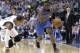 Oklahoma City Thunder guard Reggie Jackson, right, drives against Dallas Mavericks guard Monta Ellis during the first half of an NBA basketball game Tuesday, March 25, 2014, in Dallas. (AP Photo/LM Otero)