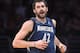 Minnesota Timberwolves forward Kevin Love looks on after scoring during the first half of an NBA basketball game against the Los Angeles Lakers, Sunday, Nov. 10, 2013, in Los Angeles. (AP Photo/Mark J. Terrill)