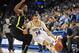 February 27, 2014; Los Angeles, CA, USA; UCLA Bruins guard Zach LaVine (14) moves the ball against the Oregon Ducks during the overtime period at Pauley Pavilion. Mandatory Credit: Gary A. Vasquez-USA TODAY Sports
