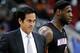 Oct 23, 2012; Raleigh, NC, USA; Miami Heat head coach Erik Spoelstra and small forward LeBron James (6) during a timeout against the Charlotte Bobcats in the first half at PNC Arena. Mandatory Credit: Mark Dolejs-USA TODAY Sports