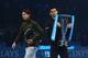 LONDON, ENGLAND - NOVEMBER 11: Rafael Nadal (L) of Spain walks away as Novak Djokovic of Serbia holds the trophy after their men's singles final match during day eight of the Barclays ATP World Tour Finals at O2 Arena on November 11, 2013 in London, England. (Photo by Clive Brunskill/Getty Images)