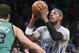 Brooklyn Nets forward Paul Pierce (34) looks to shoot over Boston Celtics center Kris Humphries (43) during the second half of an NBA basketball game at the Barclays Center, Friday, March 21, 2014, in New York. The Nets defeated the Celtics, 114-98. (AP Photo/John Minchillo)