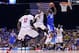 Mar 28, 2014; Indianapolis, IN, USA; Kentucky Wildcats forward Julius Randle (30) shoots against Louisville Cardinals guard Terry Rozier (0) in the first half in the semifinals of the midwest regional of the 2014 NCAA Mens Basketball Championship tournament at Lucas Oil Stadium. Mandatory Credit: Bob Donnan-USA TODAY Sports