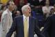 San Antonio Spurs head coach Gregg Popovich reacts after being called for a technical foul during the third quarter of their NBA basketball game against the Golden State Warriors Saturday, March 22, 2014, in Oakland, Calif. San Antonio won the game 99-90. (AP Photo/Eric Risberg)