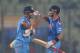 DHAKA, BANGLADESH - MARCH 28: Virat Kohli and MS Dhoni of India embrace after winning the ICC World Twenty20 Bangladesh 2014 match between Bangladesh and India at Sher-e-Bangla Mirpur Stadium on March 28, 2014 in Dhaka, Bangladesh. (Photo by Scott Barbour/Getty Images)