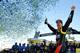 MARTINSVILLE, VA - OCTOBER 27: Jeff Gordon, driver of the #24 Drive To End Hunger Chevrolet, celebrates in victory lane after winning the NASCAR Sprint Cup Series Goody's Headache Relief Shot 500 Powered By Kroger at Martinsville Speedway on October 27, 2013 in Martinsville, Virginia. (Photo by Rainier Ehrhardt/Getty Images)