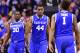 Mar 28, 2014; Indianapolis, IN, USA; Kentucky Wildcats center Dakari Johnson (44) and guard/forward James Young (1) and forward Julius Randle (30) react in the second half in the semifinals of the midwest regional of the 2014 NCAA Mens Basketball Championship tournament against the Louisville Cardinals at Lucas Oil Stadium. Mandatory Credit: Bob Donnan-USA TODAY Sports