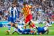 BARCELONA, SPAIN - MARCH 29: Hector Moreno (2nd, L) and Cristhian Stuani (R) of RCD Espanyol fight for the ball with Lionel Messi (C) of FC Barcelona during the La Liga match between RCD Espanyol and FC Barcelona at Cornella-El Prat Stadium on March 29, 2014 in Barcelona, Spain. (Photo by Alex Caparros/Getty Images)