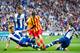 BARCELONA, SPAIN - MARCH 29: Hector Moreno (L) and Cristhian Stuani (R) of RCD Espanyol fight for the ball with Lionel Messi (C) of FC Barcelona during the La Liga match between RCD Espanyol and FC Barcelona at Cornella-El Prat Stadium on March 29, 2014 in Barcelona, Spain. (Photo by Alex Caparros/Getty Images)