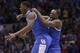 Kentucky's Alex Poythress and Aaron Harrison celebrate after an NCAA Midwest Regional semifinal college basketball tournament game against the Louisville Saturday, March 29, 2014, in Indianapolis. Kentucky won 74-69. (AP Photo/David J. Phillip)