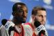 Mar 27, 2014; Indianapolis, IN, USA; Louisville Cardinals guard/forward Luke Hancock (right) and guard Russ Smith (left) at a press conference during practice for the midwest regional of the 2014 NCAA Tournament at Lucas Oil Stadium. Mandatory Credit: Thomas J. Russo-USA TODAY Sports