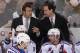 WINNIPEG, MB - MARCH 14: Head coach Alain Vigneault (L) of the New York Rangers and associate coach Scott Arniel talk on the bench in first-period action against the Winnipeg Jets at the MTS Centre on March 14, 2014 in Winnipeg, Manitoba, Canada. Both Vigneault and Arniel were head coaches of the AHL's Manitoba Moose. Arniel also played with both the original Winnipeg Jets and the Manitoba Moose. (Photo by Marianne Helm/Getty Images)