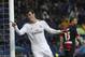 Real's Gareth Bale, left, celebrates his goal during a Spanish La Liga soccer match between Real Madrid and Rayo Vallecano at the Santiago Bernabeu stadium in Madrid, Spain, Saturday, March 29, 2014. (AP Photo/Andres Kudacki)