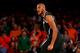Michigan State's Adreian Payne celebrates after scoring in the second half of a regional semifinal against Virginia at the NCAA men's college basketball tournament, early Saturday, March 29, 2014, in New York. Michigan State won 61-59. (AP Photo/Seth Wenig)