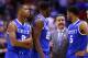 INDIANAPOLIS, IN - MARCH 28: Head coach John Calipari of the Kentucky Wildcats talks with Aaron Harrison #2, Alex Poythress #22 and Andrew Harrison #5 against the Louisville Cardinals during the regional semifinal of the 2014 NCAA Men's Basketball Tournament at Lucas Oil Stadium on March 28, 2014 in Indianapolis, Indiana. (Photo by Andy Lyons/Getty Images)