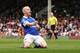 Everton's Steven Naismith celebrates his second goal against Fulham during their English Premier League soccer match at Craven Cottage, London, Sunday, March 30, 2014. (AP Photo/Sang Tan)