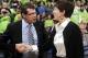 FILE - In this March 4, 2013, file photo, Connecticut head coach Geno Auriemma, left, shakes hands with Notre Dame head coach Muffet McGraw before an NCAA college basketball game in South Bend, Ind. McGraw and Auriemma have been crossing paths for years. They meet again Sunday in a national semifinal game in New Orleans, at the Women's Final Four of the NCAA college basketball tournament. (AP Photo/Joe Raymond, File)