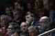 Tottenham Hotspur's coach Tim Sherwood, center, covers his mouth on the stands while watching their Europa League round of 16, second leg, soccer match with Benfica Thursday, March 20 2014, at Benfica's Luz stadium. (AP Photo/Armando Franca)