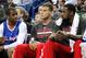Los Angeles Clippers guard Chris Paul, left, forward Blake Griffin, center, and center DeAndre Jordan, right, talk on the bench during the first half of an NBA basketball game in New Orleans, Wednesday, March 26, 2014. (AP Photo/Jonathan Bachman)